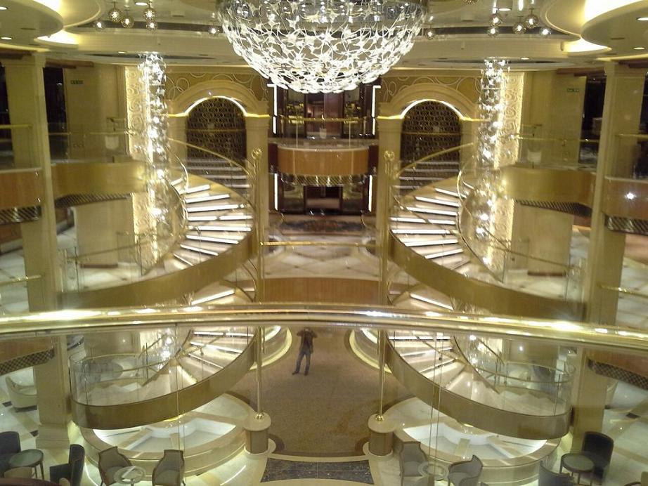 Royal Princess Atrium Fountain n° 1 & n° 2. Covering of solid curved pieces crema marfil marble