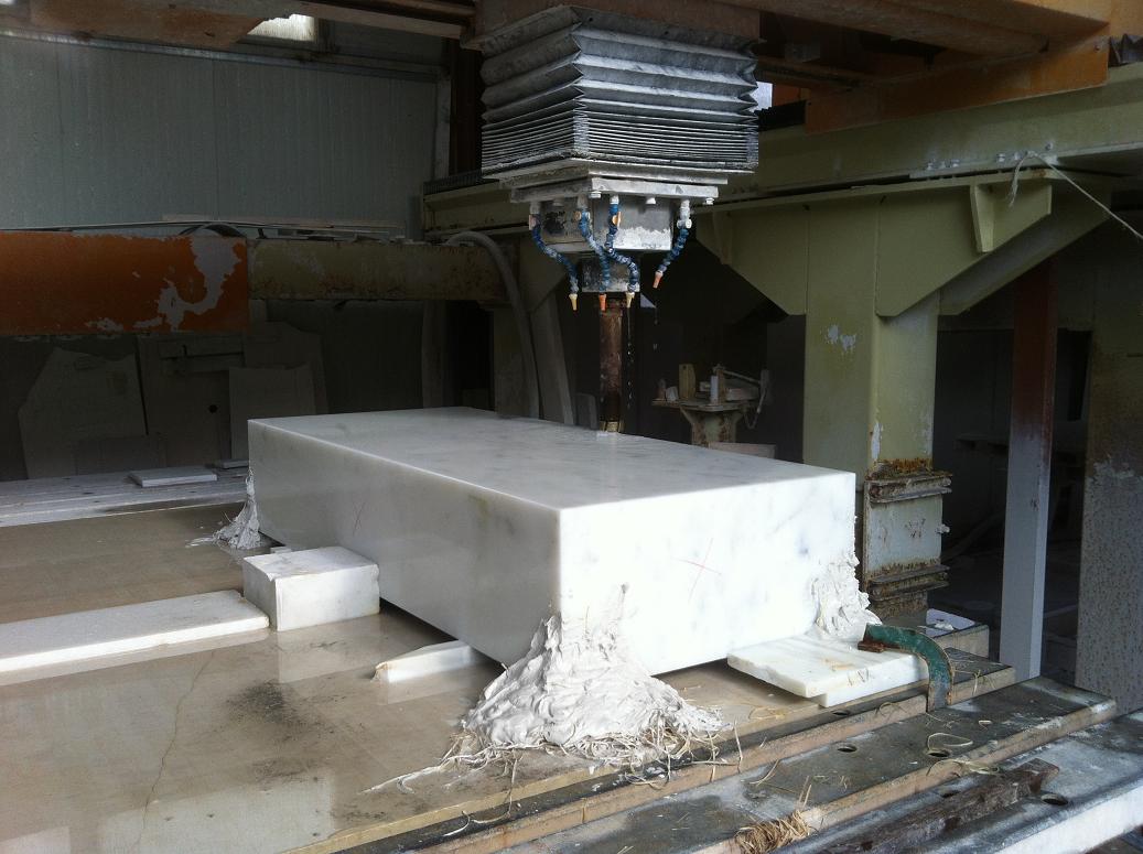 Numerical control machine to making a hole in a block of statuary marble to make a solid sinks